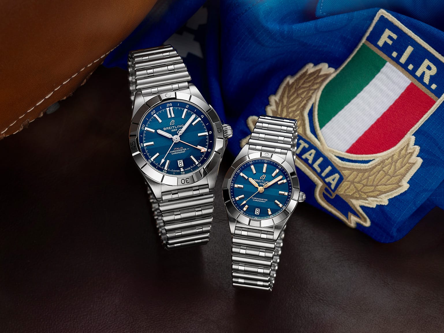 two watches sitting next to each other watches