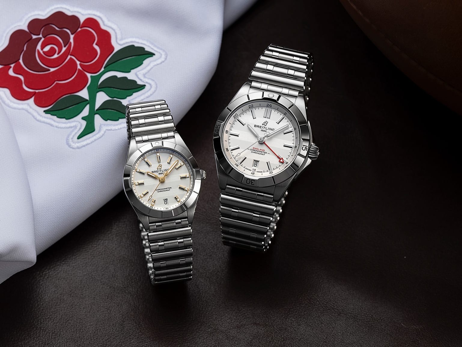 a couple of watches sitting next to each other watches